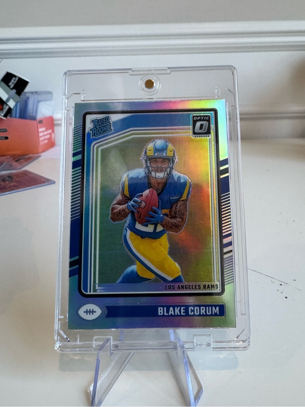 2024 Blake Corum Panini Donruss Optic Silver Prizm Rated Rookie Card.
